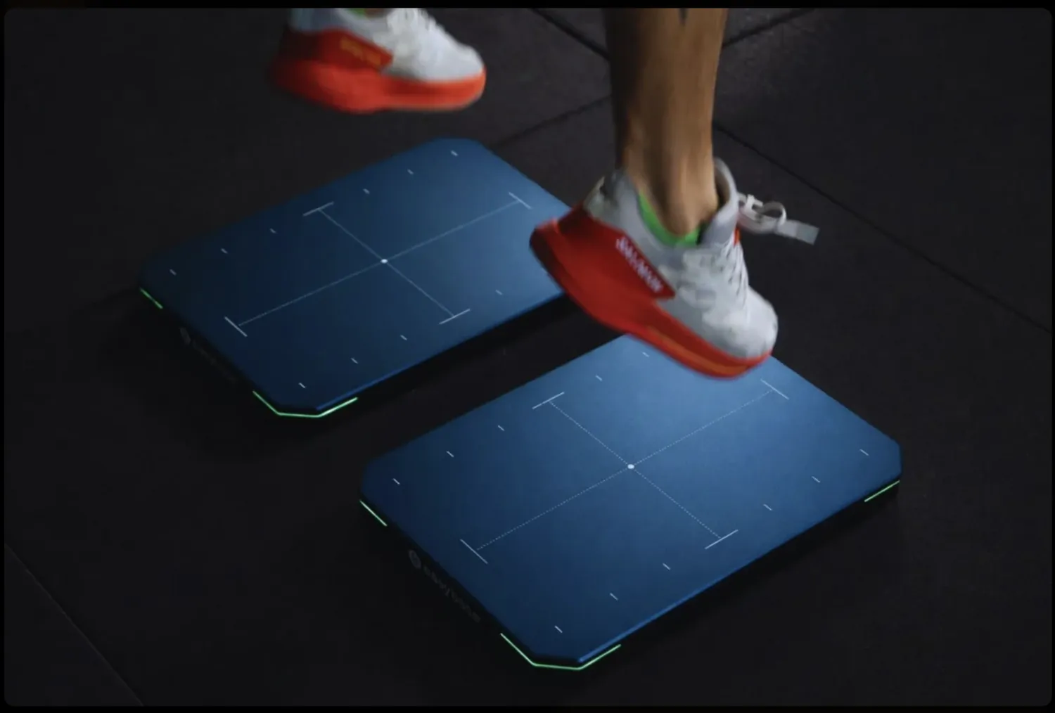 Athlete stepping onto a pair of MELOQ force plates